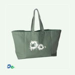 XXL-Canvastasche in der Farbe "Dusty Green" (grün) von vorne mit dem weißen Hände-Logo.